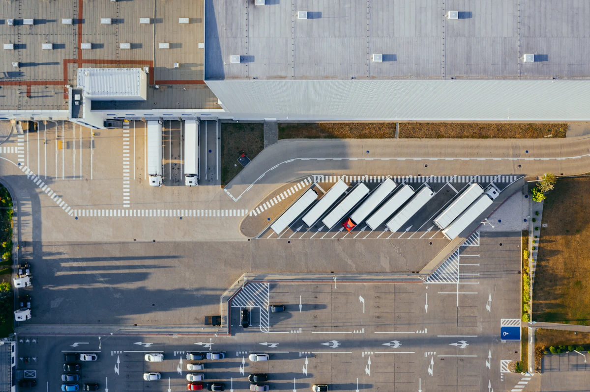 Trucks parked at a logistics yard, aerial view