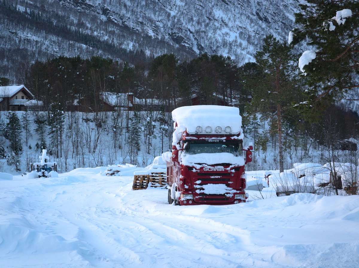 Truck on a snowy mountain route
